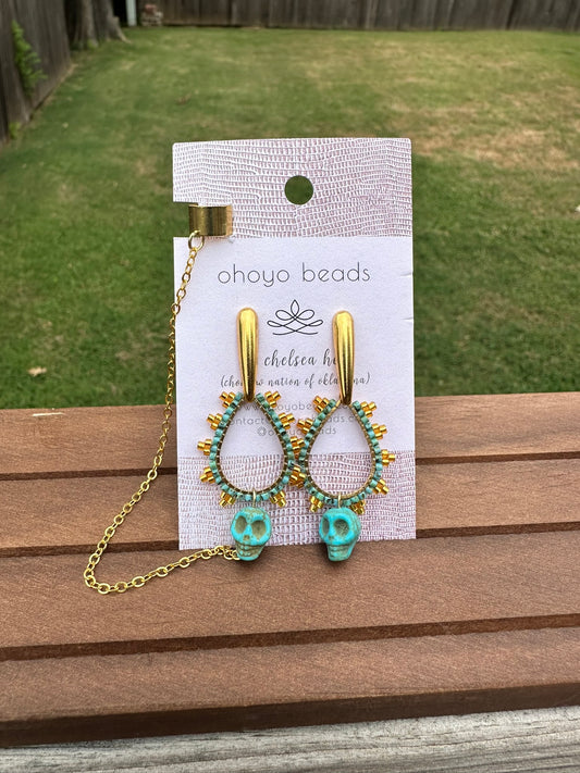 Turquoise skull cuffs